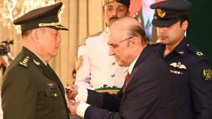 President decorates General Li Qiaoming with Nishan-i-Imtiaz Military