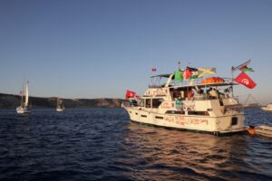 On Wednesday, an international flotilla transporting humanitarian aid to Gaza reported tense encounters with Israeli naval vessels. The organizers of the Global Sumud Flotilla reported that Israeli warships used intimidatory maneuvers and disrupted navigation and communication systems as the convoy neared the blockaded enclave. Two ships, Alma and Sirius, were surrounded, as confirmed by those involved, with video showing a military ship on the approach of Sirius. The flotilla is carrying food and medical supplies and contains approximately 500 activists representing more than 40 nations. Italy and Spain have dispatched ships to check on the situation and insisted that they would not intervene militarily. The incident highlights the mounting international pressures on the humanitarian crisis in Gaza and the decades-old naval blockade of Israel.