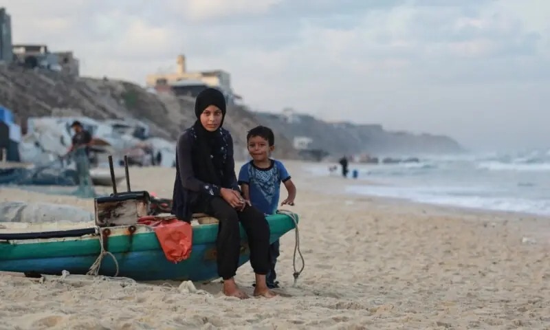 Two years into Israel’s ongoing bombardment of Gaza, the human toll is staggering. Over 67,000 Palestinians have been killed, according to Gaza’s health ministry — figures the UN deems credible. Whole neighbourhoods have vanished, with homes, schools, hospitals and water systems reduced to rubble. Survivors like 36-year-old Hanan Mohammed from Jabalia describe lives shattered beyond repair: “We have lost everything — our homes, family, friends.” With hundreds of thousands now displaced, the humanitarian crisis shows no sign of easing.
