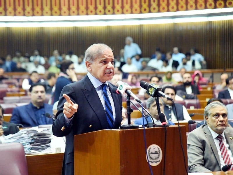 Prime Minister Shehbaz Sharif on Wednesday accused Afghanistan and India of involvement in recent terrorism, vowing a “befitting response” to the nation’s enemies following a suicide blast in the capital and an attempted attack that he said was reminiscent of the 2014 APS massacre. “It is no more a secret that an external hand is visible [in attacks in Pakistan]”, PM Shehbaz said during his address to the National Assembly following the passage of the controversial 27th Cons­ti­tutional Amendment. He also condemned what he called a “dastardly” attempt by terrorists to carry out an incident in Wana, South Waziristan.